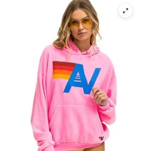 Pink Graphic Hoodie with Blue 'AV' Logo